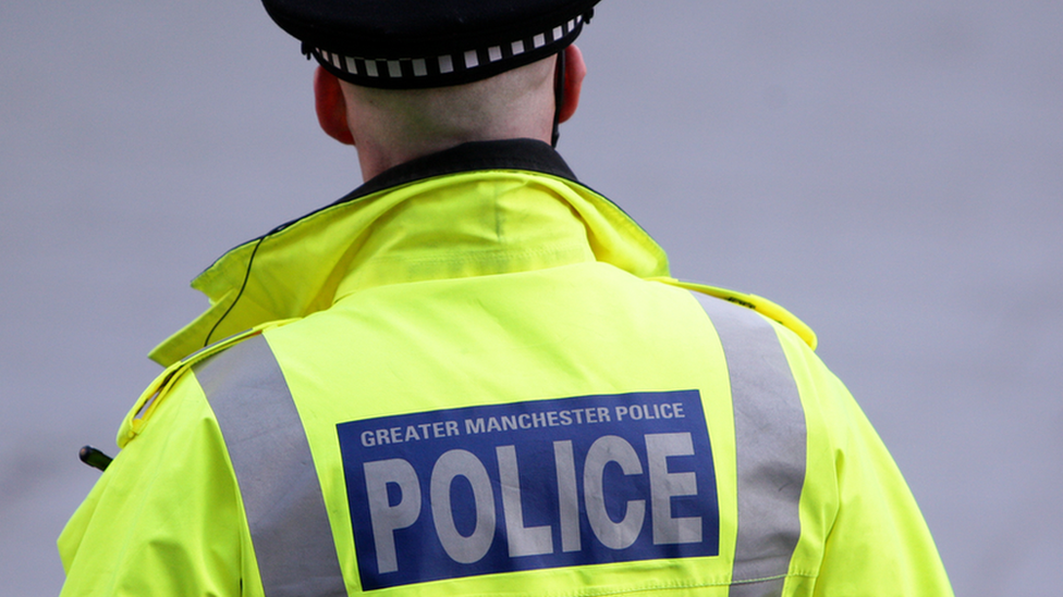 A police jacket with Greater Manchester Police on the back