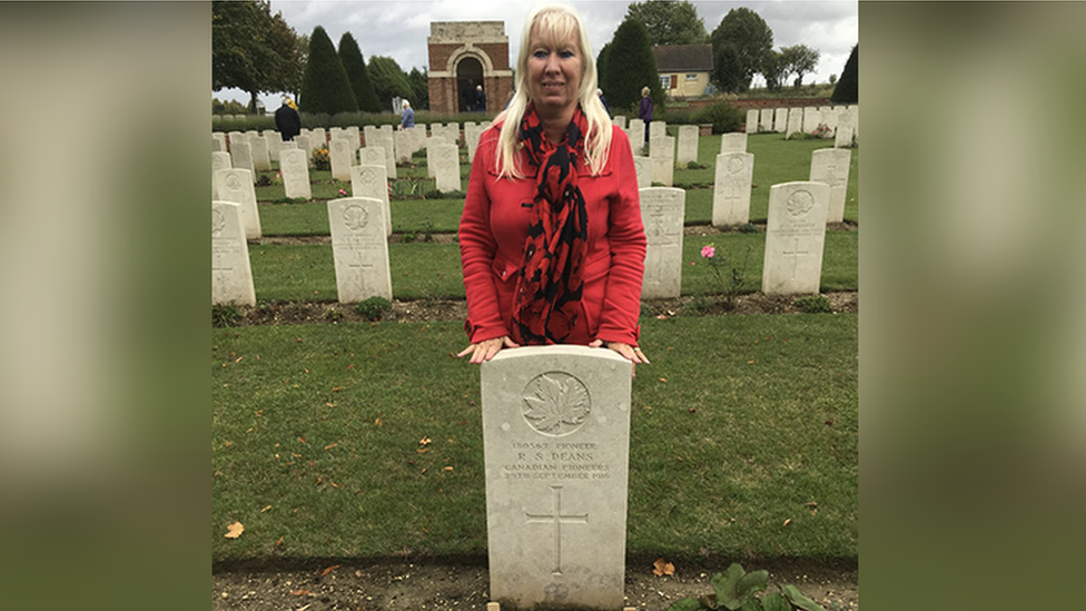 Gwyneth Jones behind grave