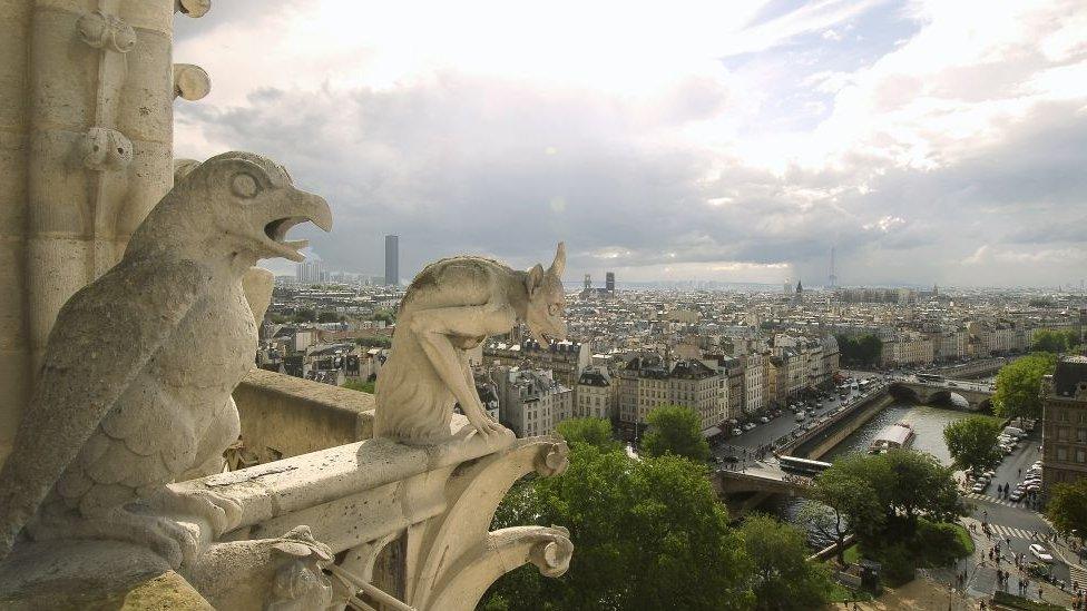 Notre-Dame "gargoyles" look out over the city