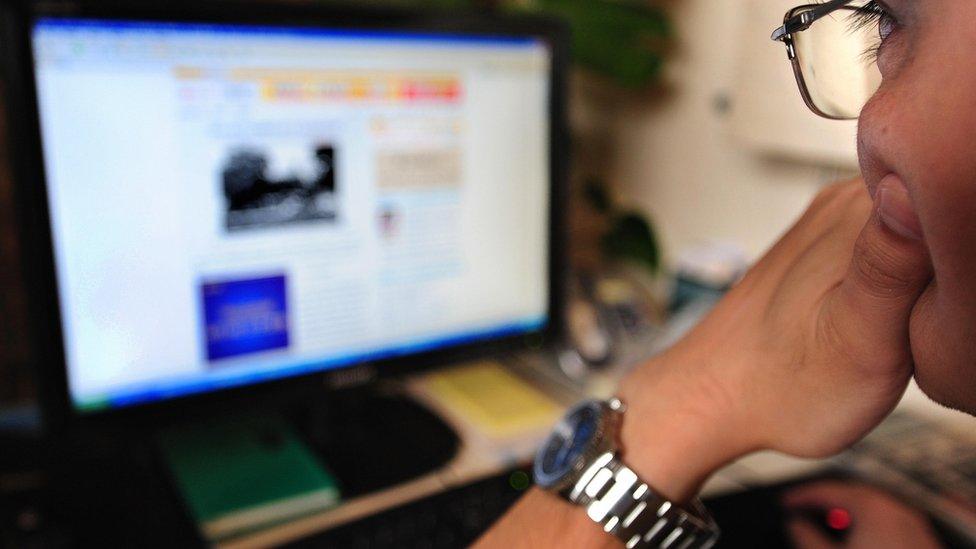 A man surfs the internet in Beijing on June 15, 2009.