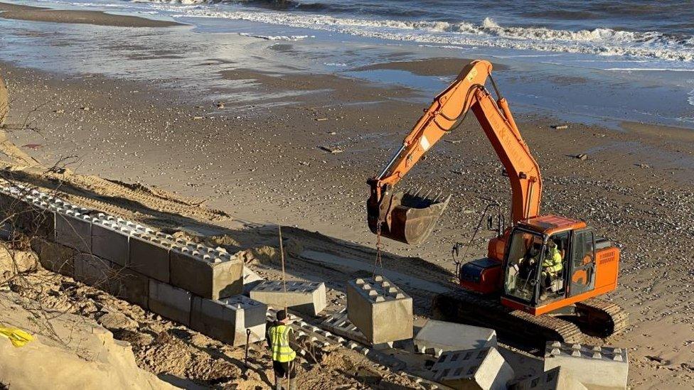 A digger on Hemsby beach