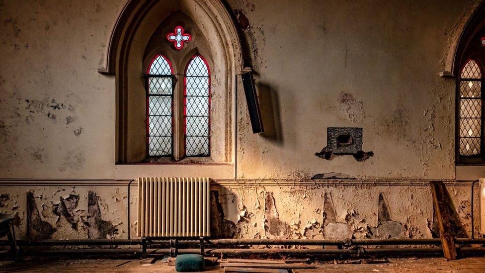 Peeling paintwork inside Christ Church in Maryport