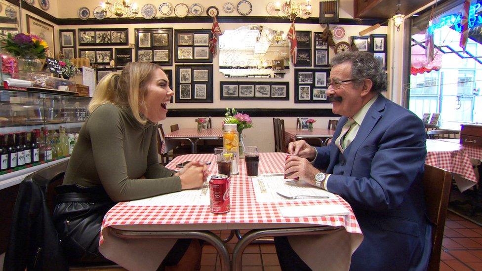 Aisleyne and Prof Winston laughing at the table