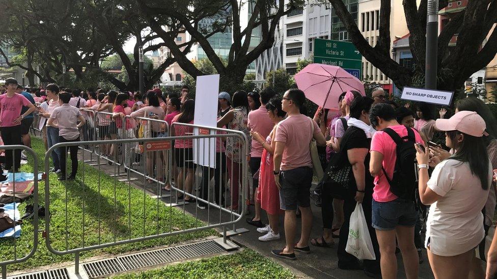 Activists queuing for security and ID checks