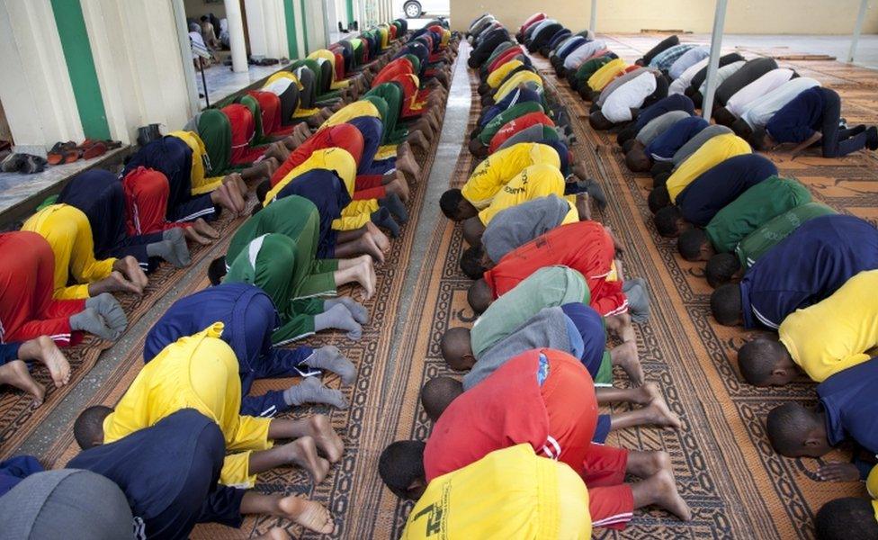 Kenyan Muslim school children offer Zohar prayers at a mosque during Islam"s holy month of Ramadan, in Nairobi, Kenya, Tuesday, June 7, 2016