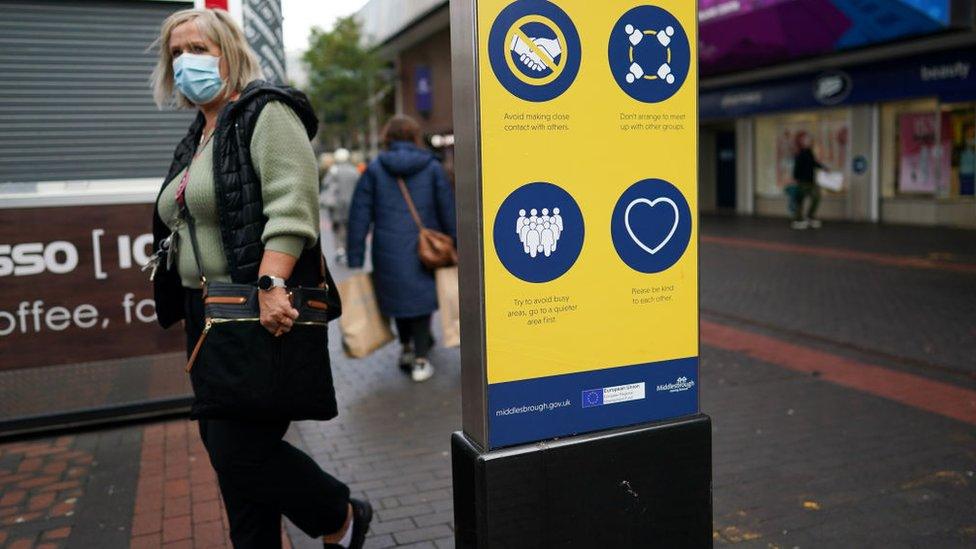 Woman walking in street in Middlesbrough