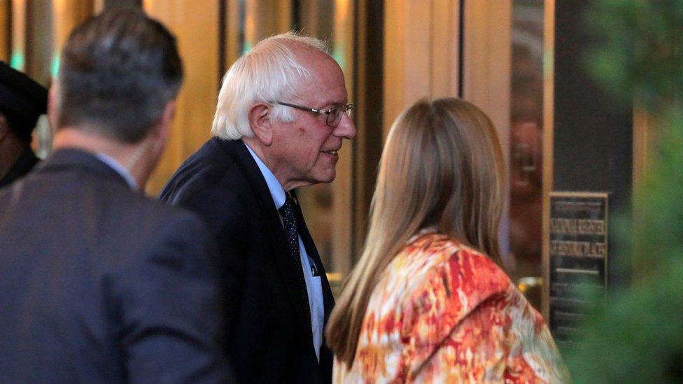 Bernie Sanders arrives for a meeting with Hillary Clinton