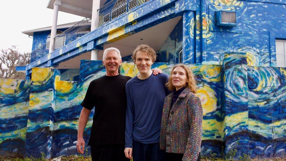 Lubomir Jastrzebski and Nancy Nembhauser with their adult son in front of the house in Mount Dora, Florida, 29 January 2018