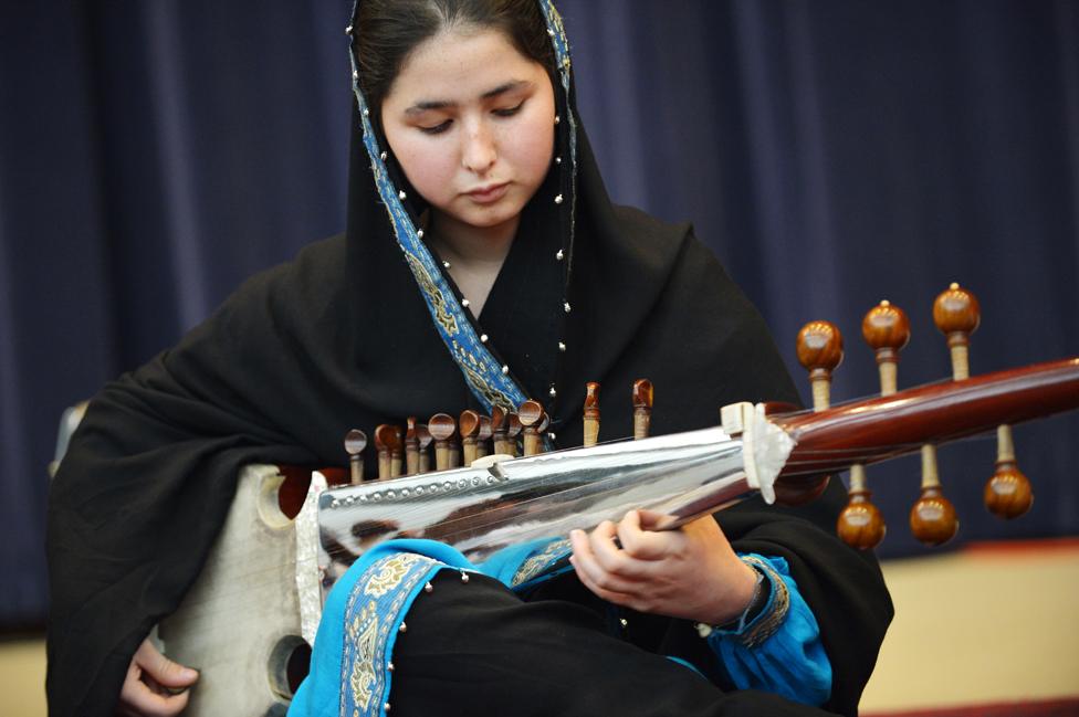 Negin Khpolwak, of the Afghanistan National Institute of Music, performs in the Dean Acheson Auditorium in February 2013 in Washington, DC