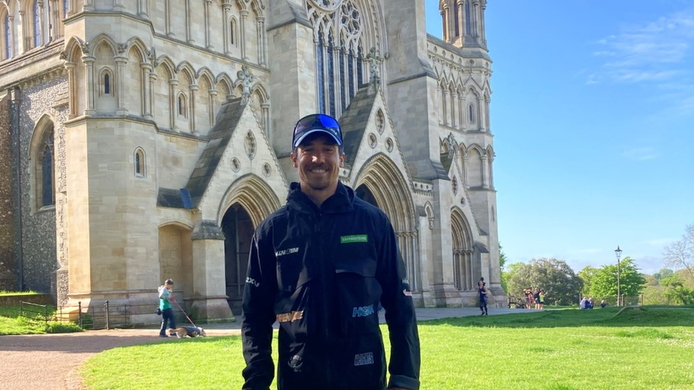 Josh Patterson in front of St Albans Cathedral