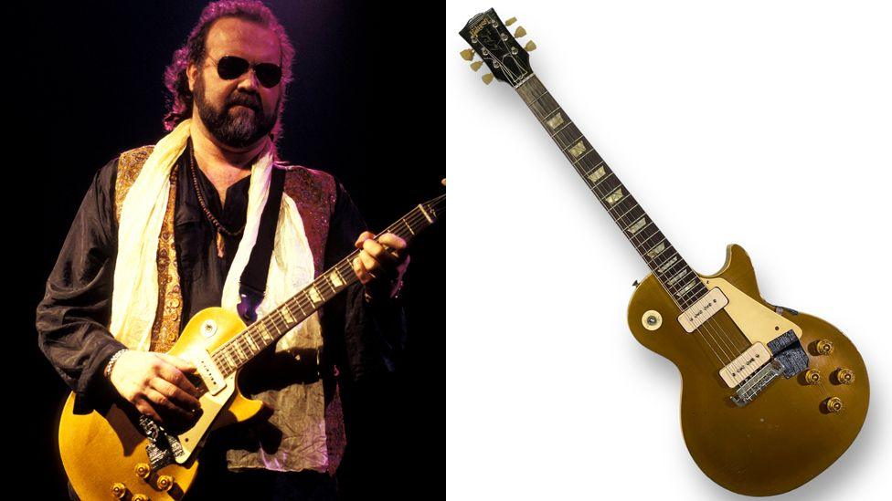 John Martyn performing and his Les Paul guitar