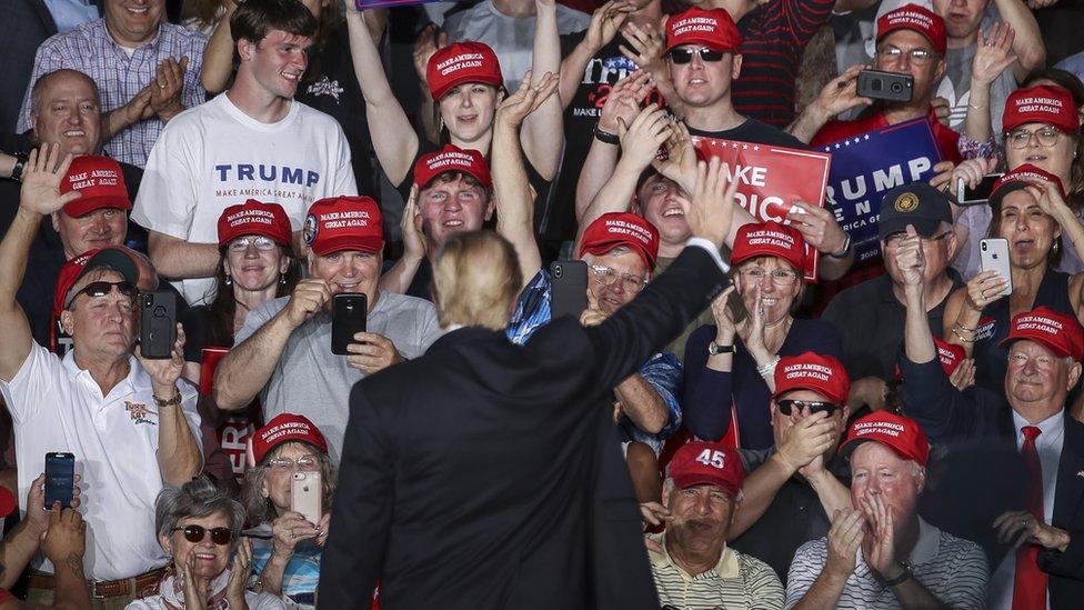 The crowd cheers as U.S. President Donald Trump waves at the end of a 'Make America Great Again' campaign rally at Williamsport Regional Airport, May 20, 2019 in Montoursville, Pennsylvania.