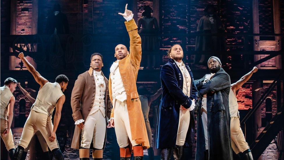 The cast of Hamilton singing on stage at the Bristol Hippodrome