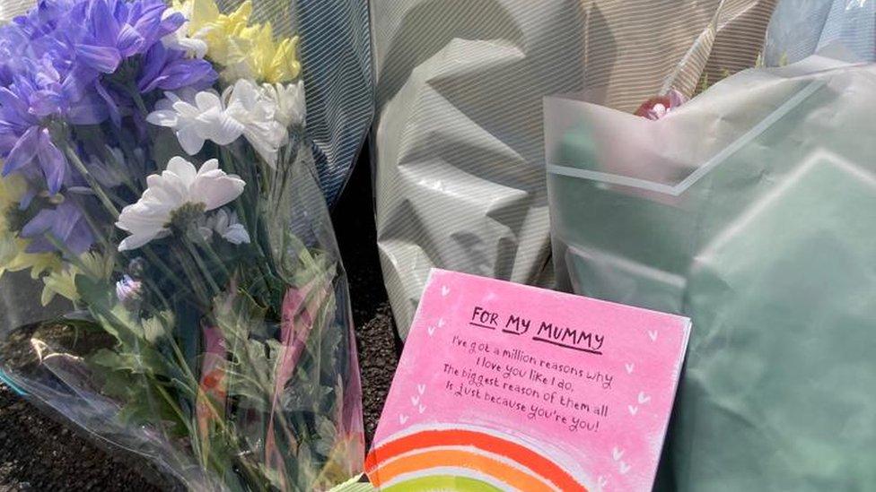 Flowers and card left at Harpe Inge after two people died