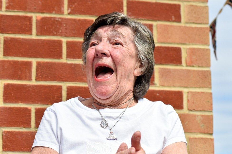 Tyler Lopes's great-grandmother smiling and laughing