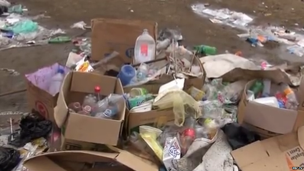 Rubbish dumped in cardboard boxes in Fiji