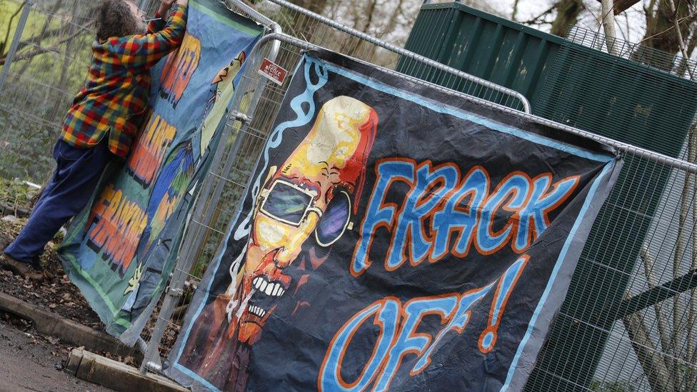 A poster that reads "frack off"