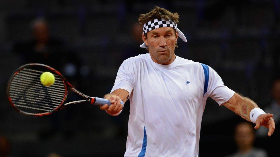 Pat Cash playing tennis