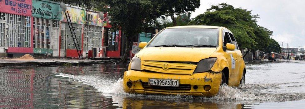 Car driving through water