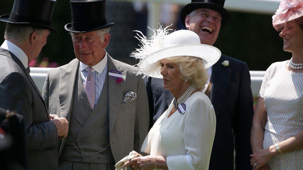 Prince Charles, Camilla with a guest. Prince Andrew and The Countess of Wessex in the background