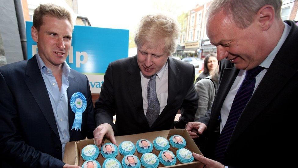 Chris Philp (left), the Conservative party candidate for the seat of Hampstead, Boris Johnson and Conservative MP Damian Green (right) enjoy some David Cameron cup cakes (photo from April 2010)