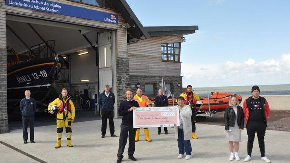 The cheque being handed over