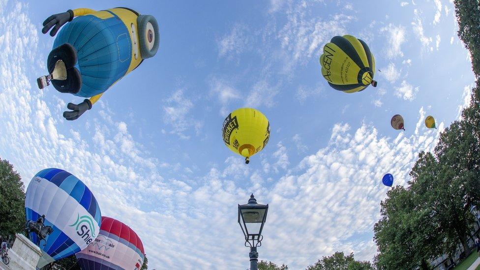 Balloons in the sky in Queen Square