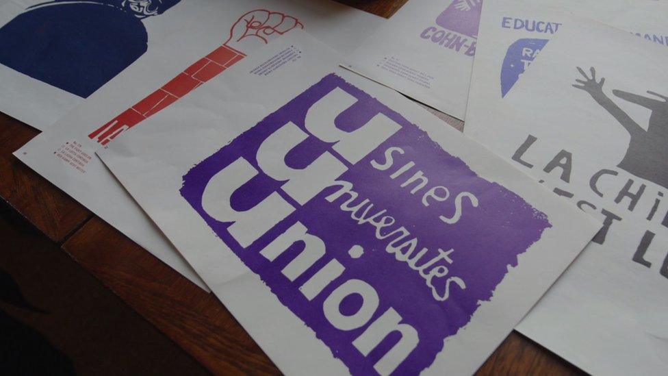 Posters on a table