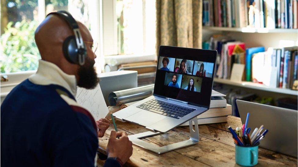 Man on Zoom meeting at home