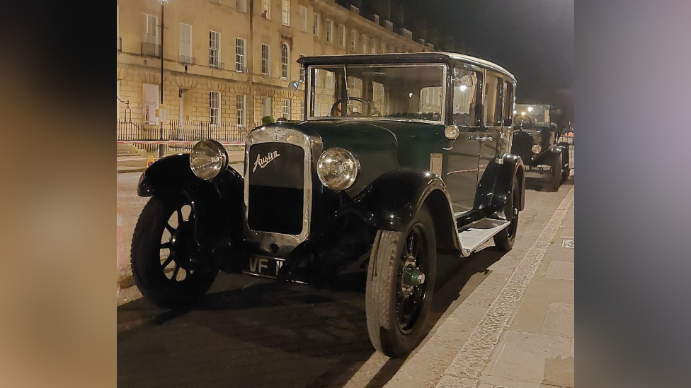 A 1920s vintage car on a film set in Bath. 