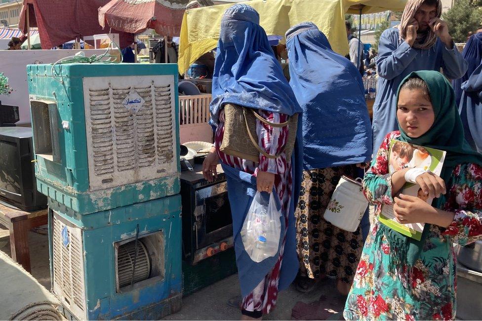 A girl at second hand market in Mazar-i-Sharif in Afghanistan