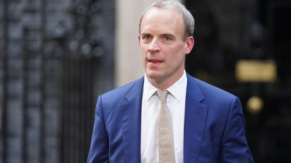 Dominic Raab walking in Downing Street