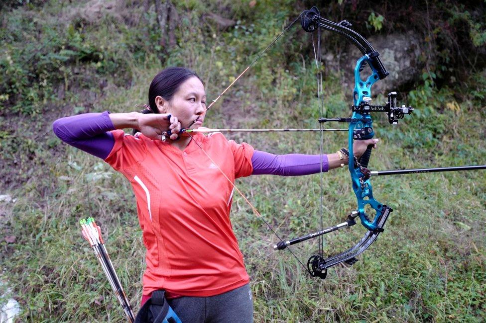 Dorji Dema taking aim