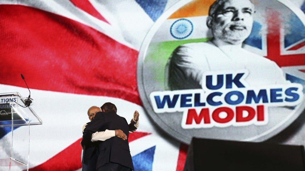 Narendra Modi and David Cameron hugging