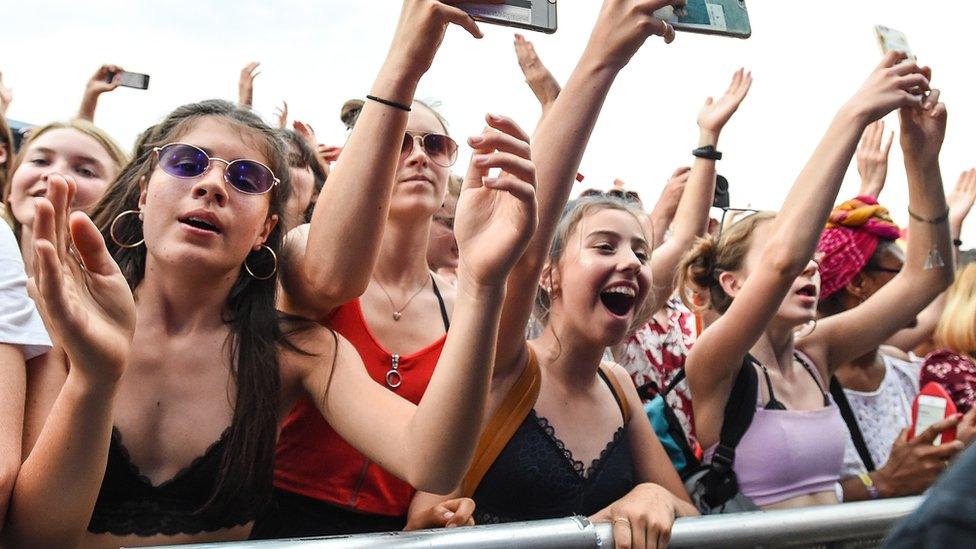 Fans enjoying the atmosphere in the crowd at Love Supreme