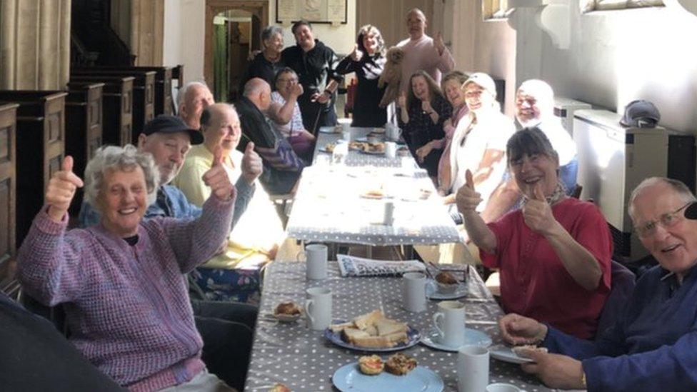 People attending a coffee morning at St George's Church, Norfolk