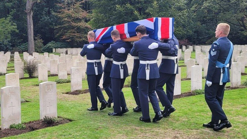 Personnel from the Queen’s Colour Squadron bear the remains of the crew of Leading Aircraftman John Stuart Mee Bromley to his final resting place.