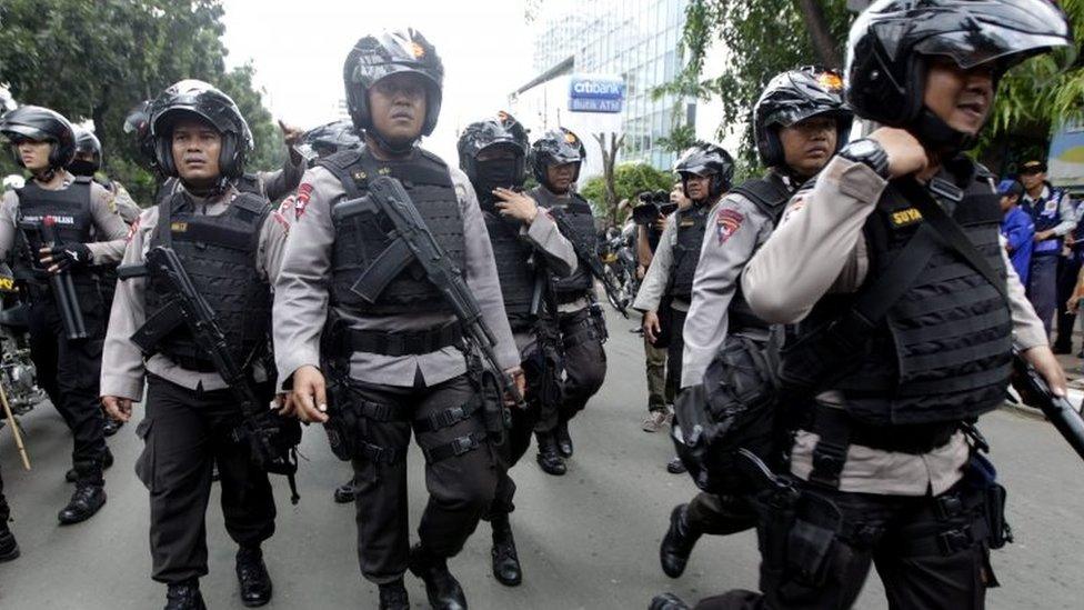 Police on patrol in Jakarta