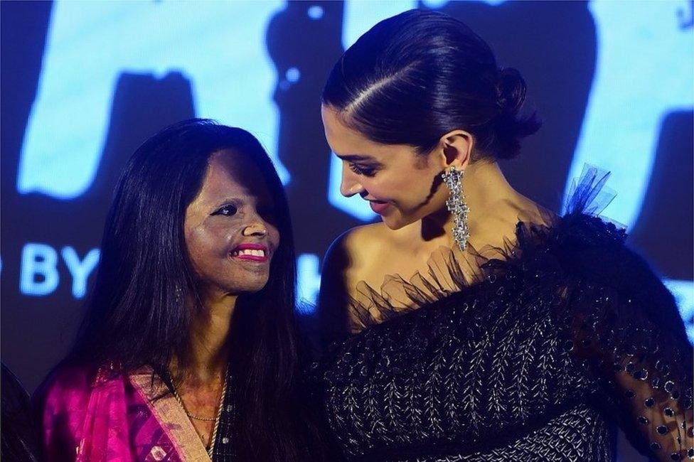 Actress and producer Deepika Padukone (R) poses with acid attack survivor Laxmi Agarwal (L) during the launch of the title track for the upcoming Hindi film Chhapaak, which tells Agarwal"s story, in Mumbai on January 3, 2020.