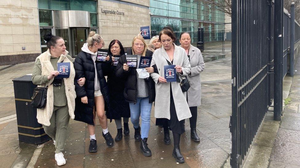 The family of Ian Ogle outside court