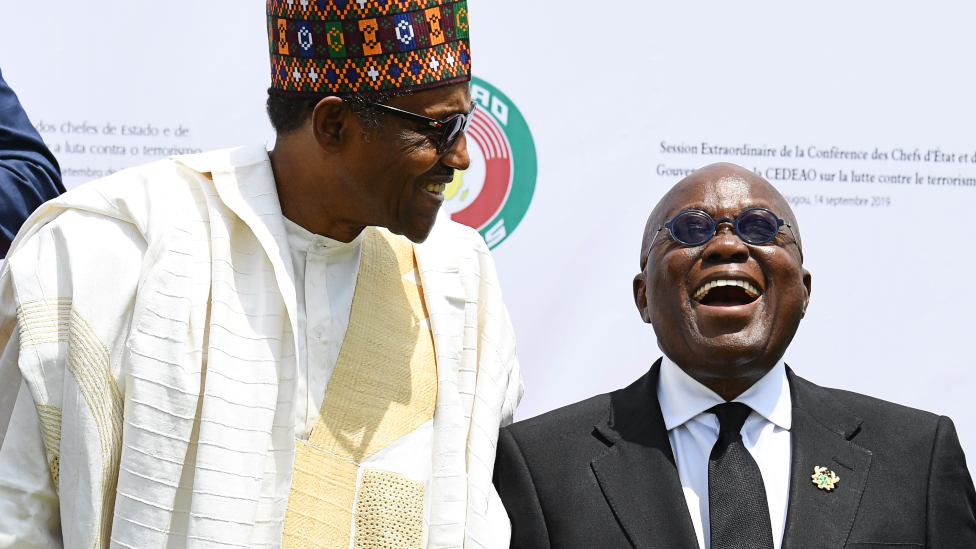 Presidents Muhammadu Buhari of Nigeria and Nana Akufo-Addo of Ghana pose after the opening ceremony of an Ecowas meeting in Burkina Faso 14 September 2019