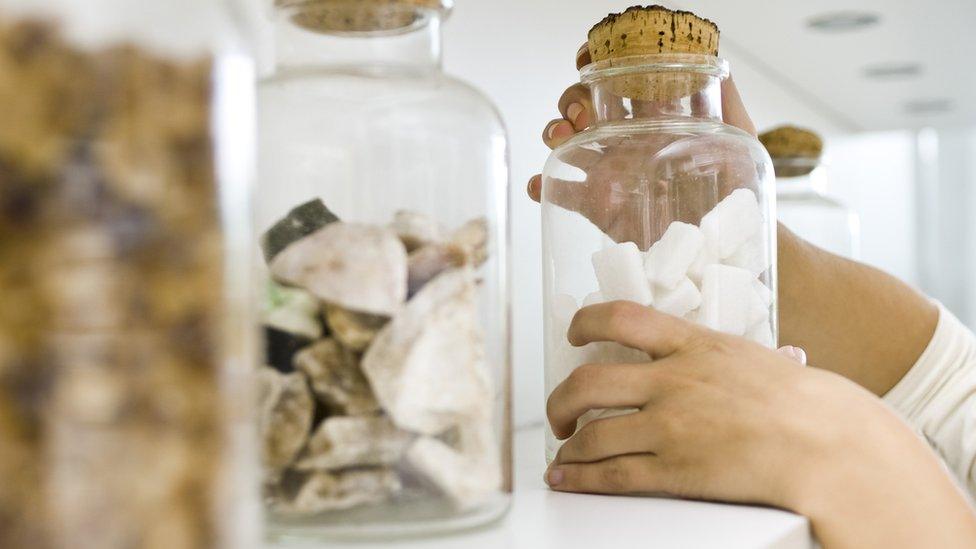 Getting ingredients down the shelf.