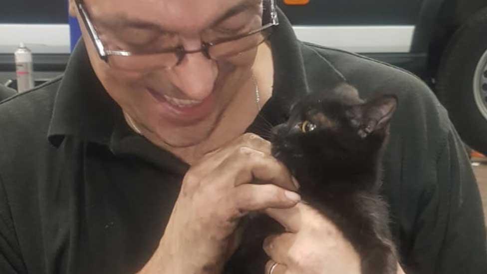 Roy Bunn with Hallie the kitten