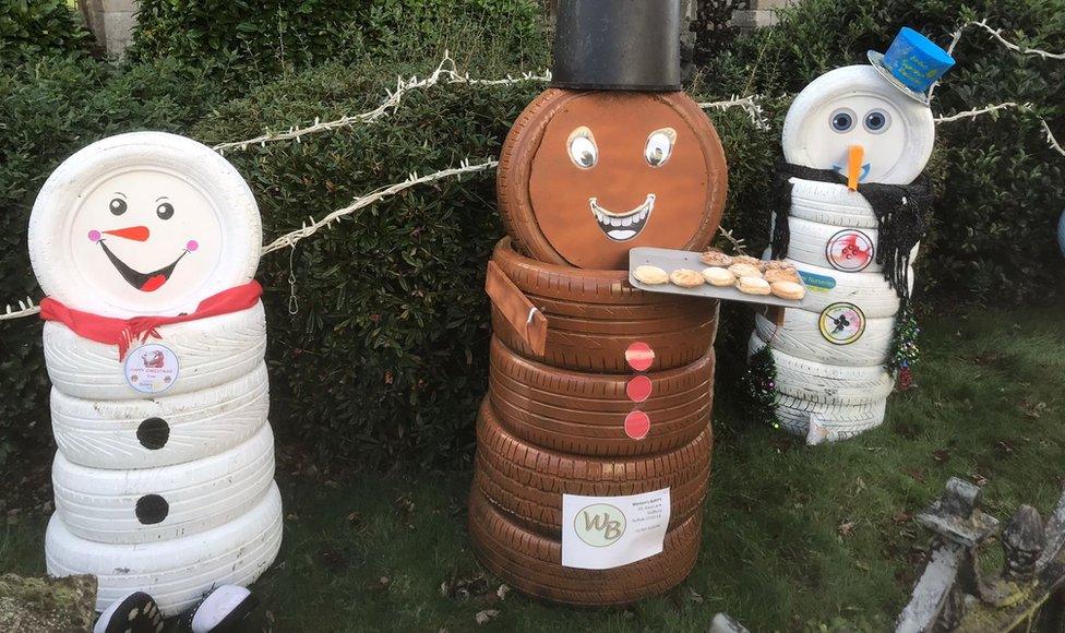 Snowmen made from old tyres in Sudbury