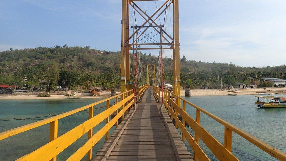 The "Yellow Bridge" which connects Nusa Lembongan and Nusa Ceningan, two islands located east of the resort island of Bali, Indonesia is seen on 29 November 2015