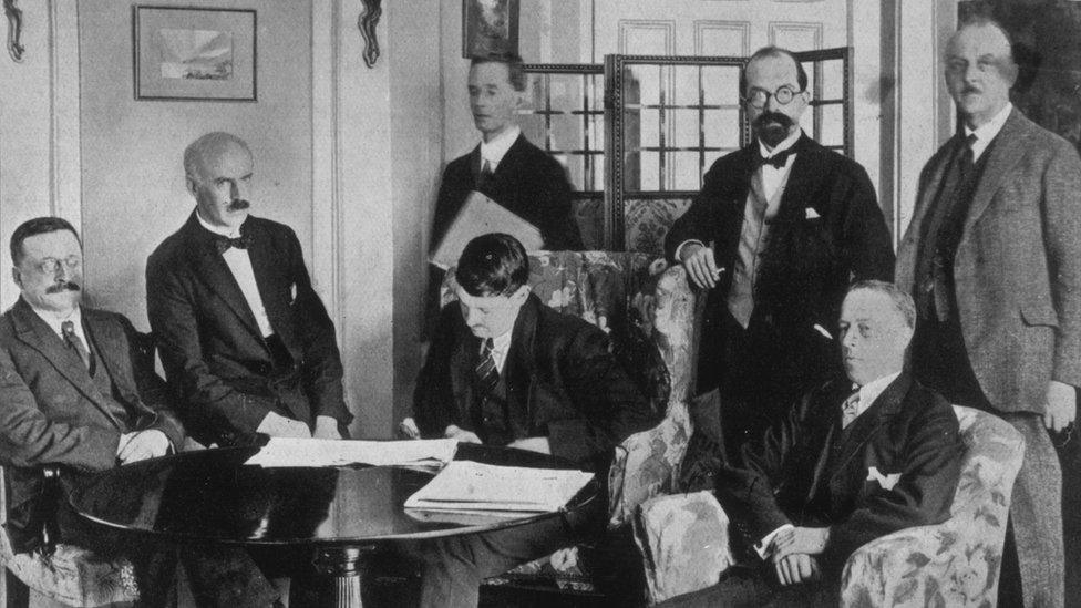 A delegation of Irish leaders including Michael Collins (centre) signed the Anglo-Irish Treaty in London in 1921, which led to the partition of Ireland