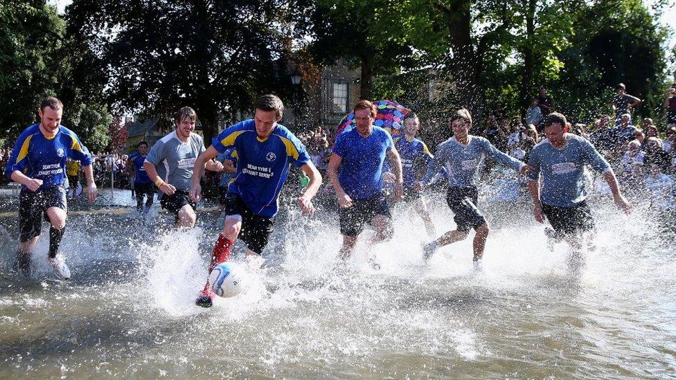 Footballers play river football