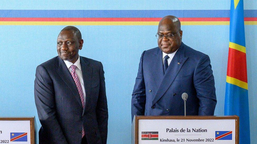 Kenyan President William Ruto (L) reacts during a joint press conference with the President of Democratic Republic of Congo, Felix Tshisekedi (R), at the Palace of the Nation in Kinshasa on November 21, 2022.