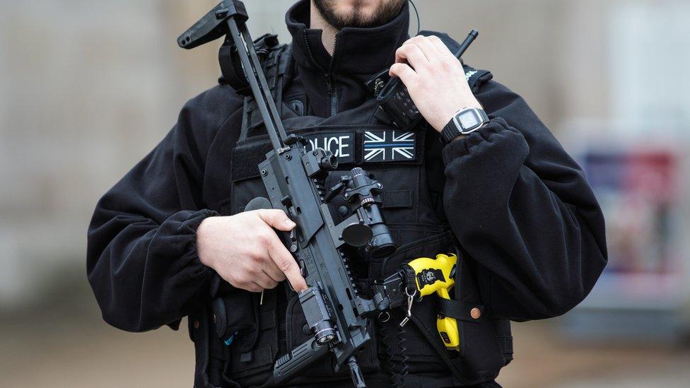 Armed police officer in London