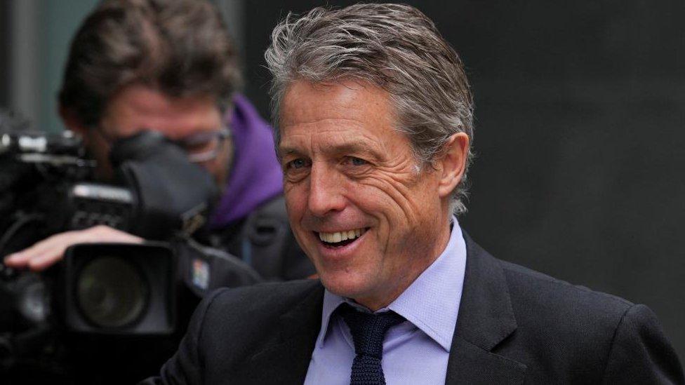 Hugh Grant arriving at court